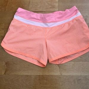 Women’s Lululemon shorts, size 8. Orange stripe